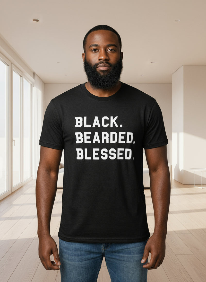 Man wearing a black t-shirt with 'BLACK. BEARDED. BLESSED.' text on a gray background