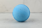Verbena Vitality Organic Bath Bomb with essential oils like cedarwood and rosemary for calming, energy-restoring bath experience.