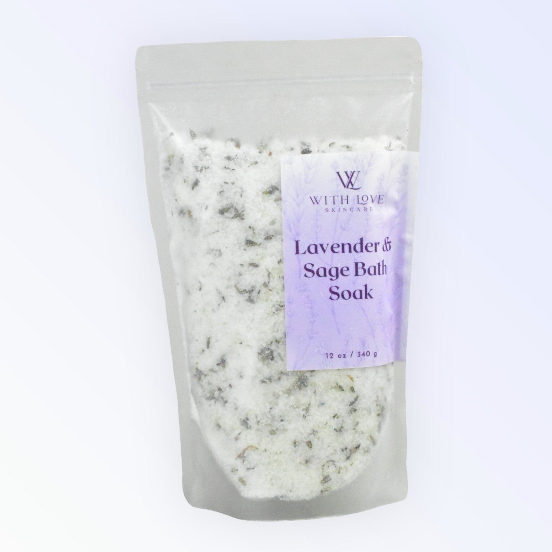 With Love Lavender & Sage Bath Soak, part of your essential skin care routine, soothing and hydrating with lavender and dead sea salts for a relaxing bath experience.